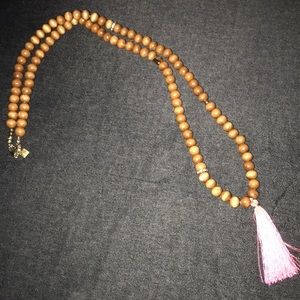 New wooden bead necklace with hot pink tassel